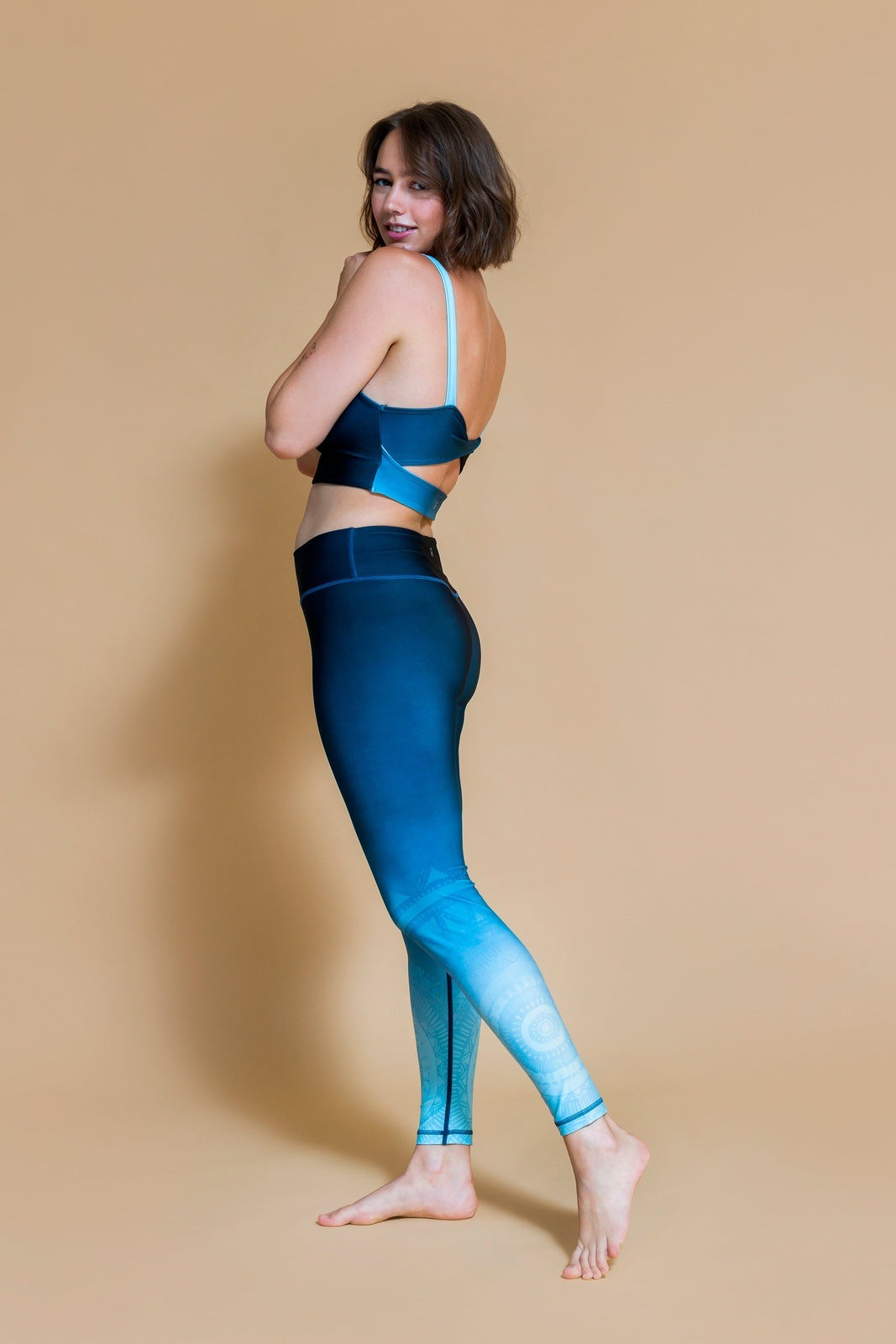 Sustainable Karma yoga Legging in Om Shanti Ocean for women crafted from recycled polyester Shambhala Barcelona.