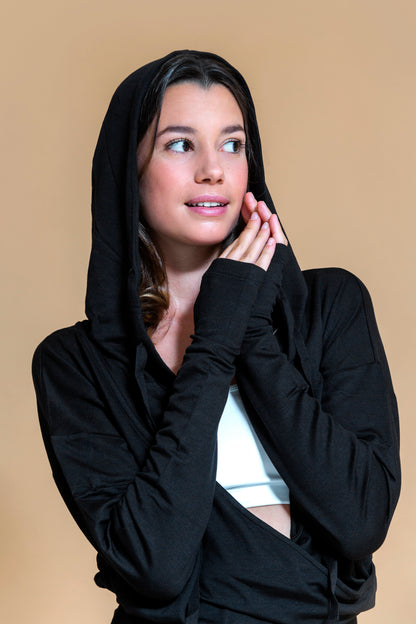 Sustainable Niyama yoga Hoodie in Black for women crafted from OCS certified organic cotton, modal and elastane blend Shambhala Barcelona.