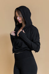 Sustainable Niyama yoga Hoodie in Black for women crafted from OCS certified organic cotton, modal and elastane blend Shambhala Barcelona.