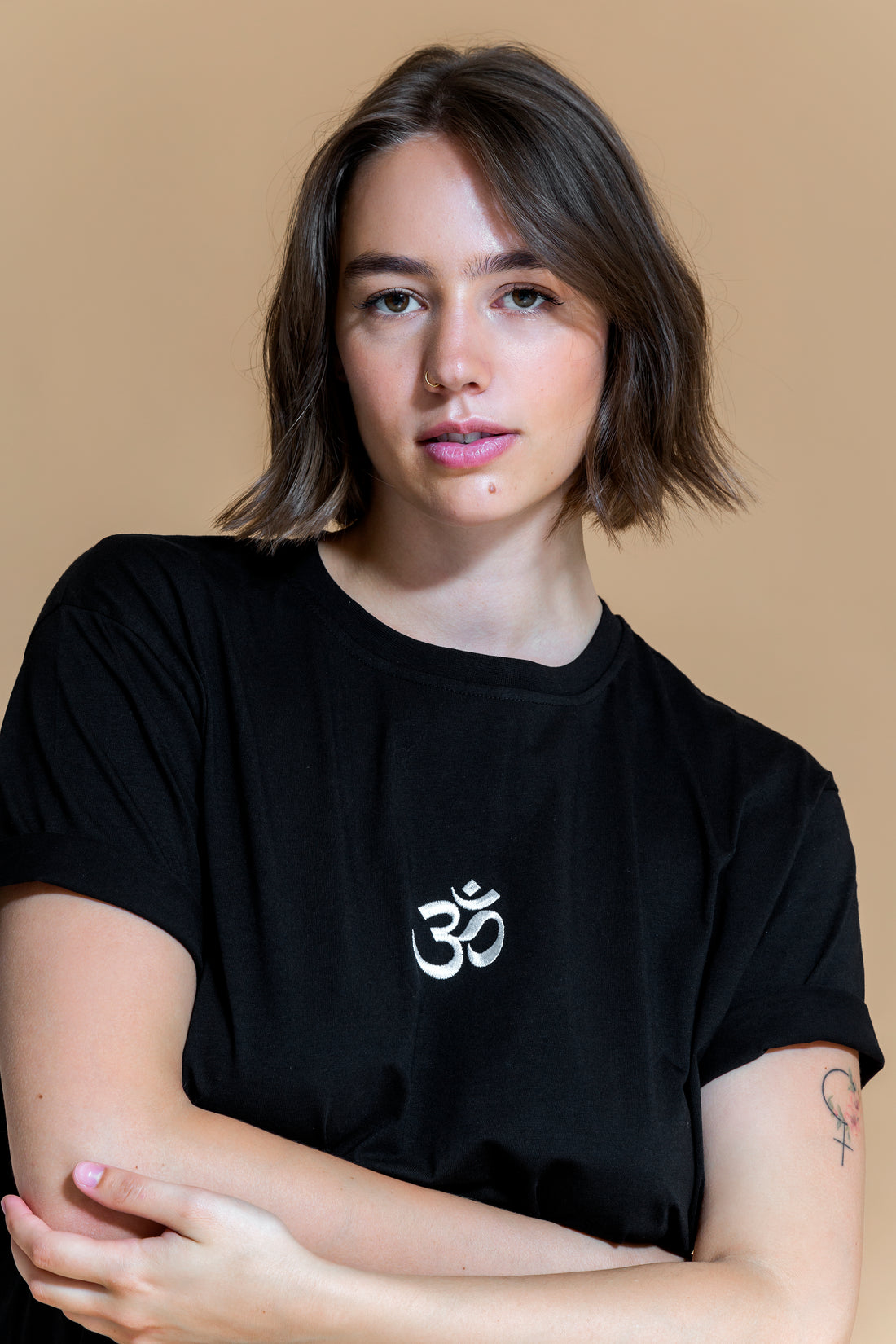 Sustainable Om yoga T-Shirt in Black for women crafted from OCS certified organic cotton Shambhala Barcelona.