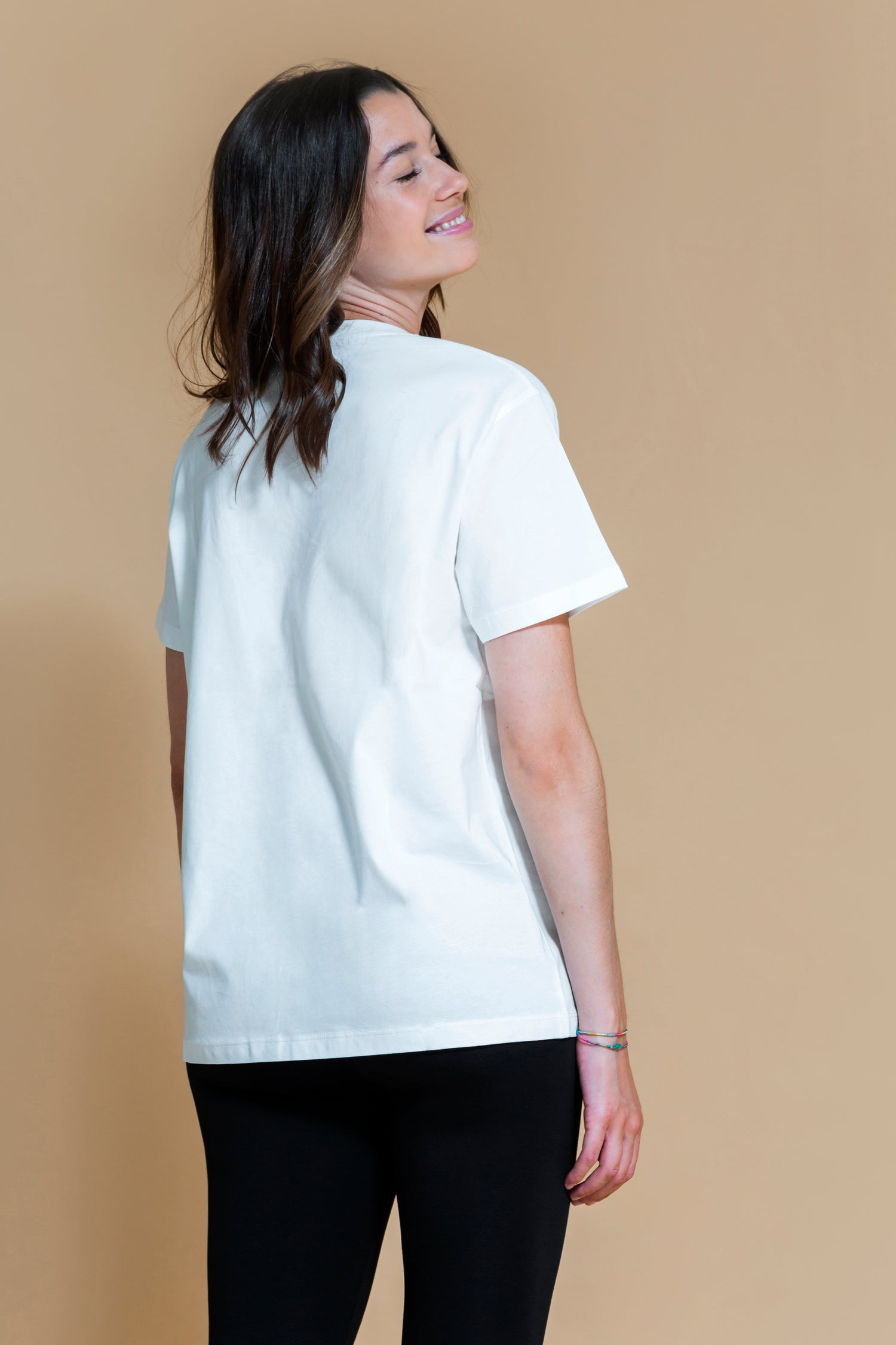 Sustainable Om yoga T-Shirt in Off White for women crafted from OCS certified organic cotton Shambhala Barcelona.